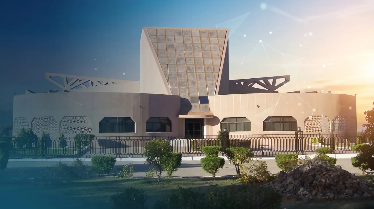 The auditorium on the MUET campus in Jamshoro, lit by the evening sun